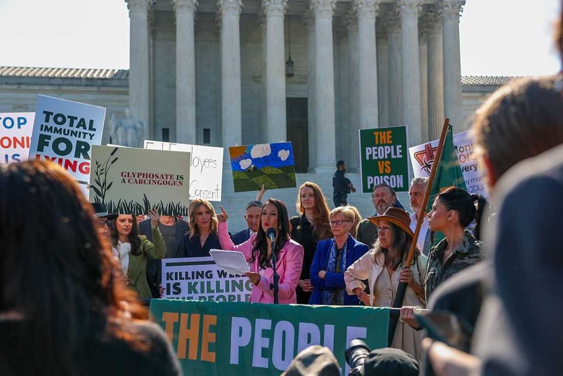 WASHINGTON, DC - APRIL 27: The People vs the Poison protesters gather at the US Supreme Court on April 27, 2026 in Washington, DC. The Supreme Court is set to hear arguments this morning in a case that could lead to the dismissal of tens of thousands of lawsuits against Bayer, the pharmaceutical and biotech giant, that claim the weedkiller Roundup, made by Monsanto, caused non-Hodgkin lymphoma. (Photo by Tasos Katopodis/Getty Images)