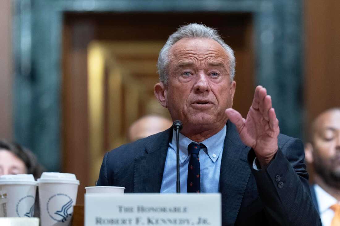 Health and Human Services Secretary Robert F. Kennedy Jr. testifies before the Senate Committee on Finance on Wednesday, April 22, 2026, in Washington. During the hearing he was questioned about his past statement that wellness farms could be used to "reparent" some children, including Black children.