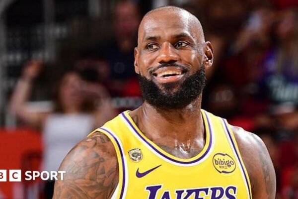 LeBron James smiles while playing for the Los Angeles Lakers against the Houston Rockets in game three of their 2026 NBA play-off series