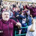 Hearts fans celebrate