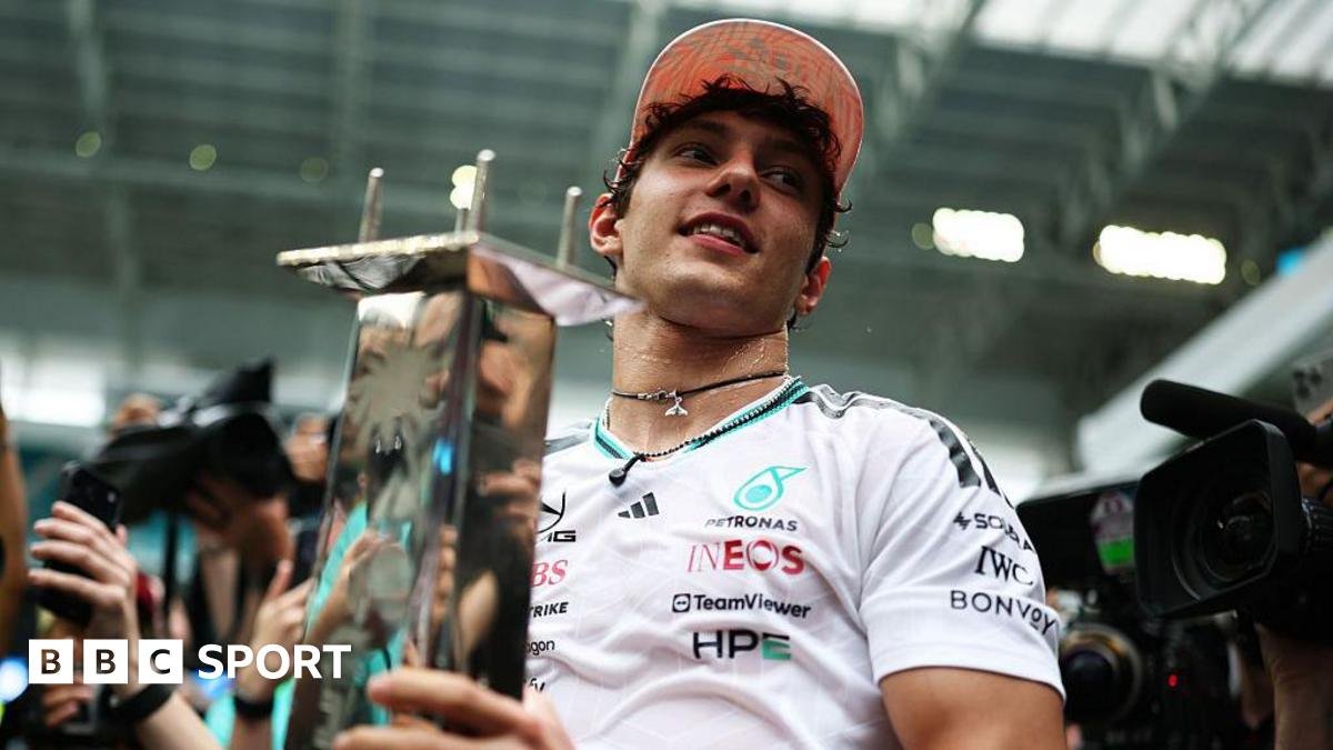 Kimi Antonelli holds his winner's trophy in Miami