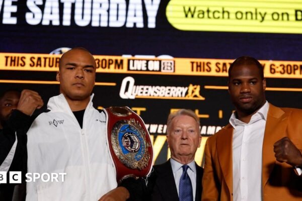 Fabio Wardley (left) and Daniel Dubois (right) stand side-by-side and hold up a fist