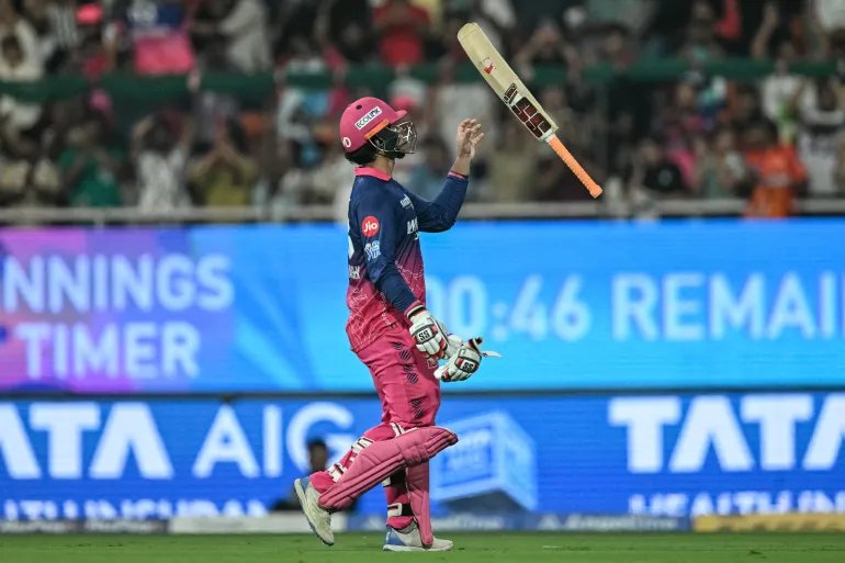 Rajasthan Royals' Indian cricket player Vaibhav Sooryavanshi tosses his bat as he walks back to the pavilion after his dismissal during the 2026 Indian Premier League (IPL) T20 Eliminator match between Rajasthan Royals and Sunrisers Hyderabad at the Maharaja Yadavindra Singh International Cricket Stadium on the outskirts of Chandigarh on May 27, 2026. (Photo by Punit PARANJPE / AFP) / -- IMAGE RESTRICTED TO EDITORIAL USE - STRICTLY NO COMMERCIAL USE --