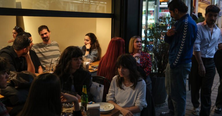 In Packed Cafes, Iranians Yearn to Escape War’s Wreckage