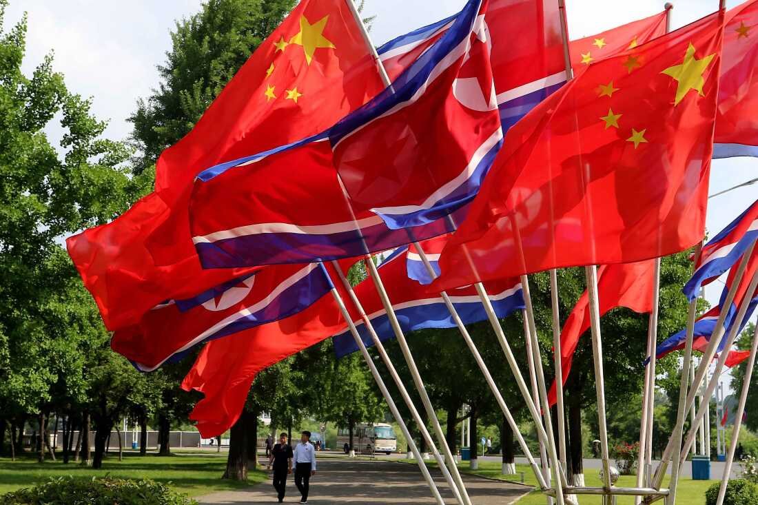 A street is decorated with the flags of China and North Korea in Pyongyang, on Monday, June 8, 2026.