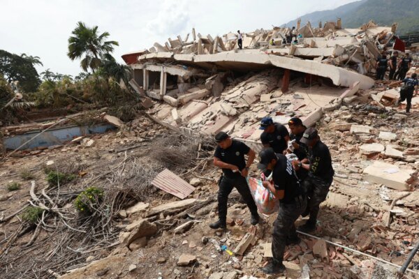 Hundreds trapped beneath buildings a day after Venezuela’s twin earthquakes