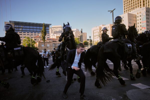 Ultra-Orthodox protesters block roads and trains across Israel over military draft