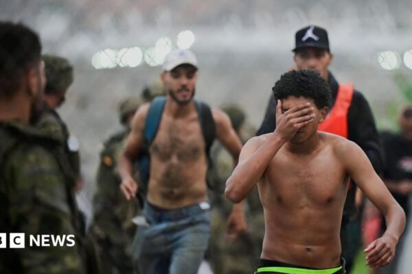 About 60,000 migrants arrive in Ceuta in 24 hours, Spanish territory's leader says