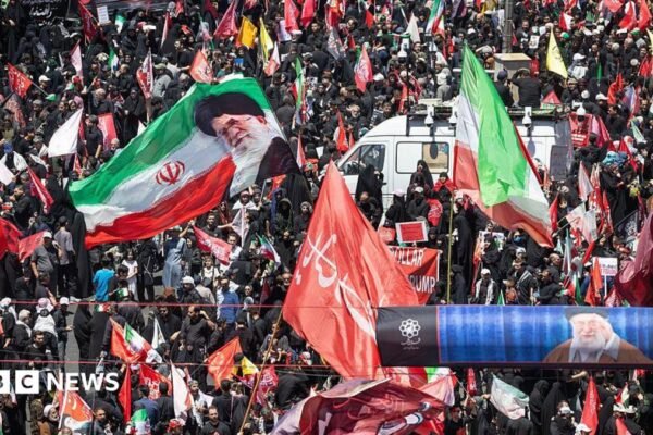 Huge crowds in Mashhad as Iran's late supreme leader is buried