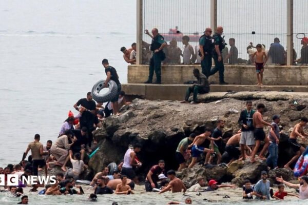 Spain sending troops as thousands enter enclave of Ceuta from Morocco