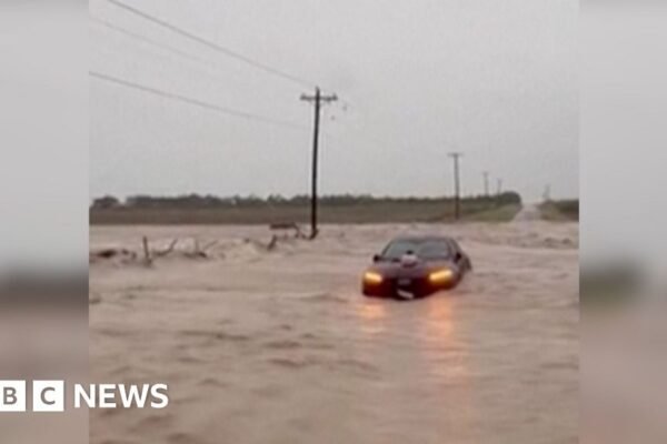 A car is under water in Texas.