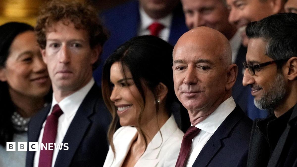 Meta CEO Mark Zuckerberg stands in a crowd next to amazon Chairman Jeff Bezos and Google CEO Sundar Pichai.