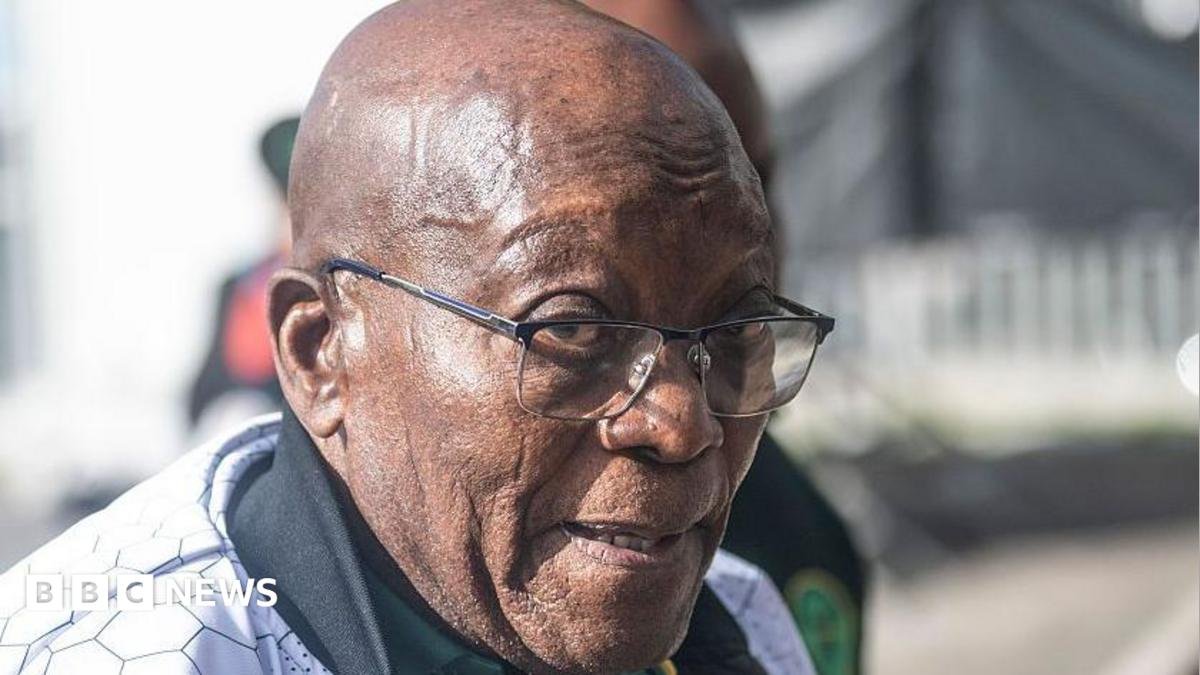 Former president Jacob Zuma is seen attending an event in his party regalia