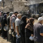 A year after the ceasefire, Gaza families still queue for food